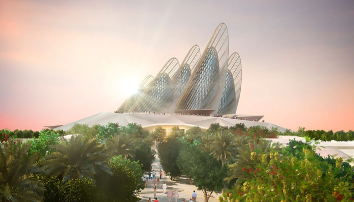Exterior View Of The Zayed National Museum Featuring Its Iconic Wing-shaped Structures And Fountain Under A Clear Abu Dhabi Sky.